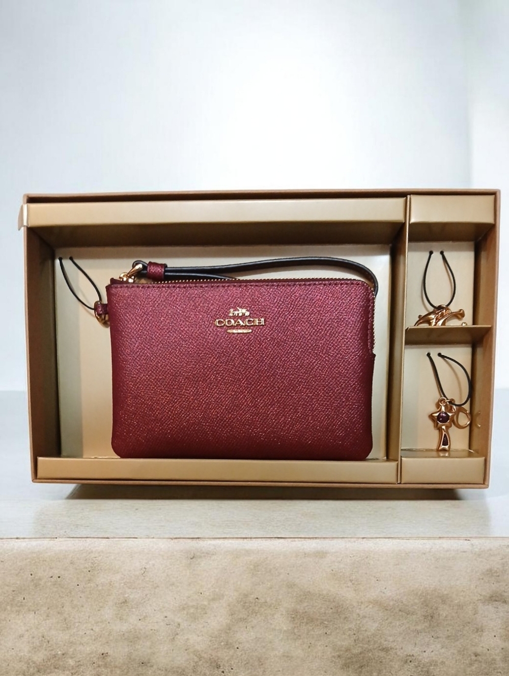 Coach Burgundy Leather Wristlet with Gold Logo